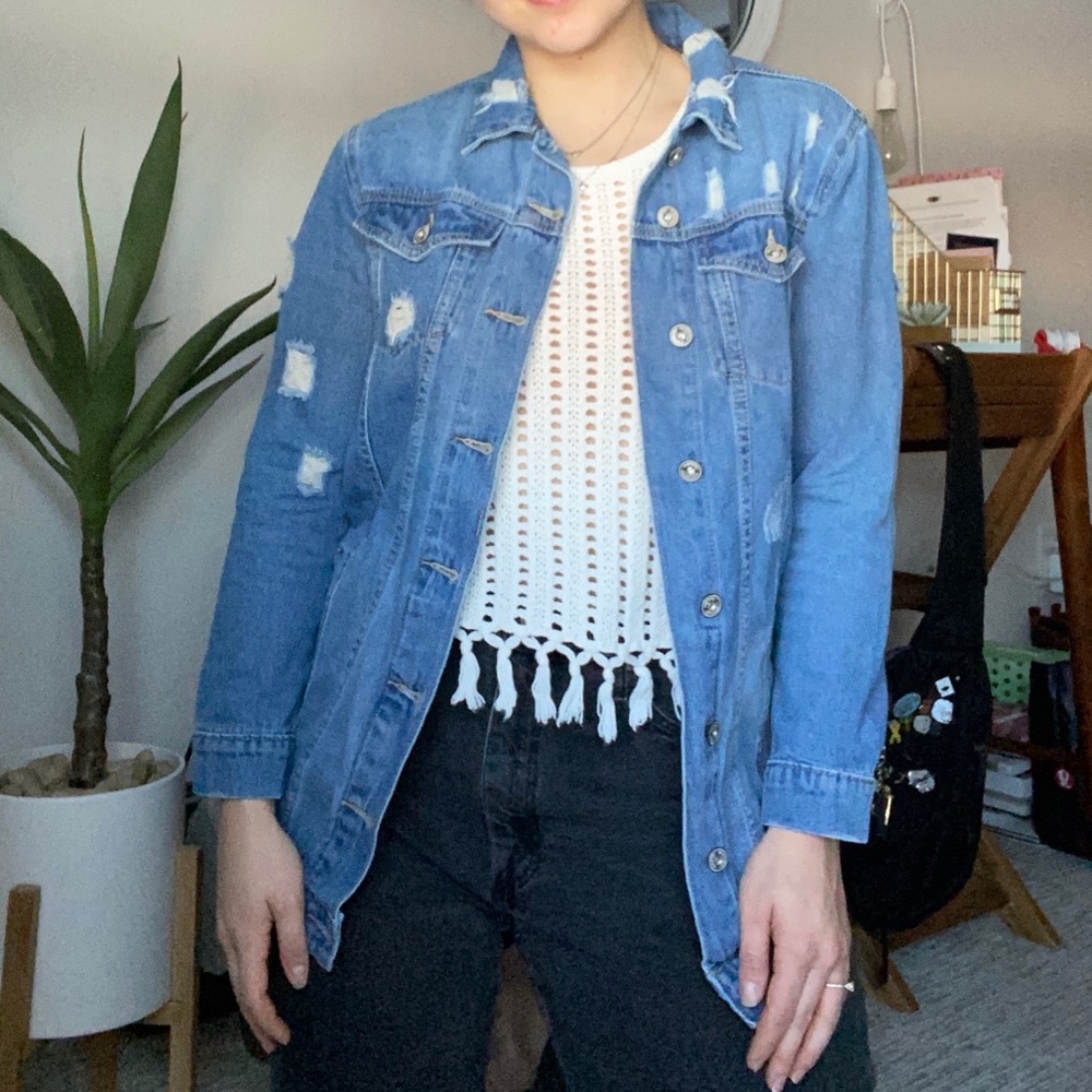 Distressed denim jacket